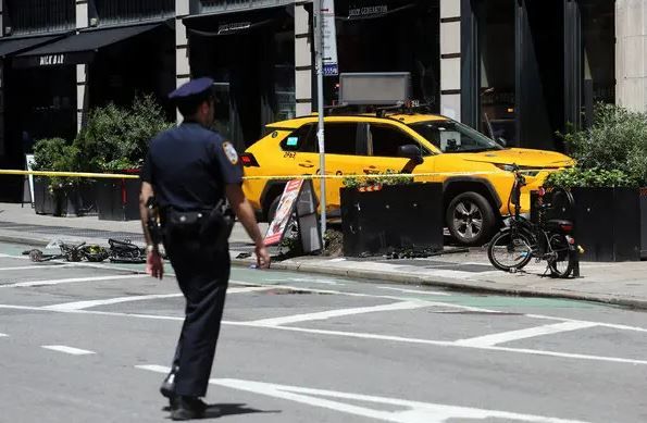 Three people are critically injured when a taxi jumped the curb in Manhattan