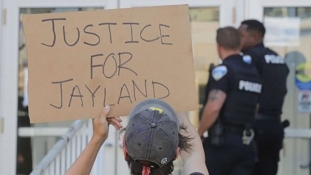 Protests over police shooting of a black man spark nationwide outrage when video emerges