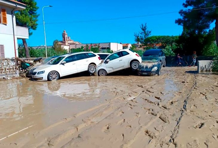 Floods in Italy claim the lives of ten people; survivors are rescued from rooftops and trees